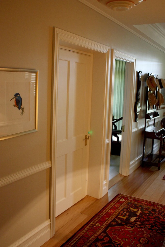 Lift Shop lift door concealed within the surrounding wall finish