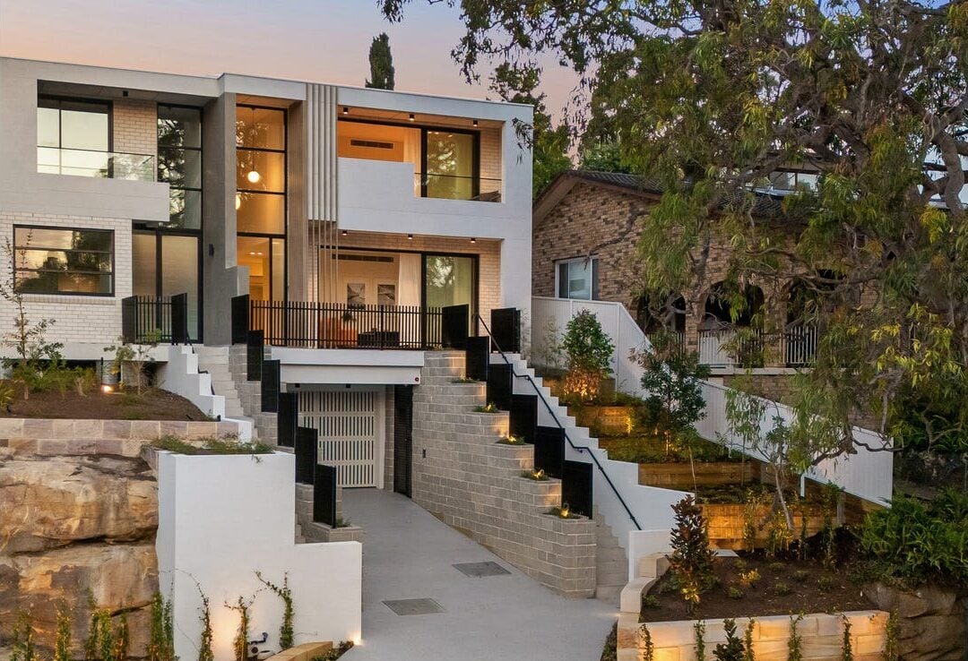 Front exterior of three-level Connells Point duplex with landscaped entry