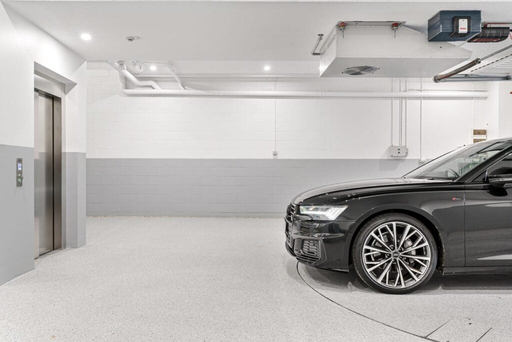Basement lift entrance adjacent to car turntable at Connells Point home