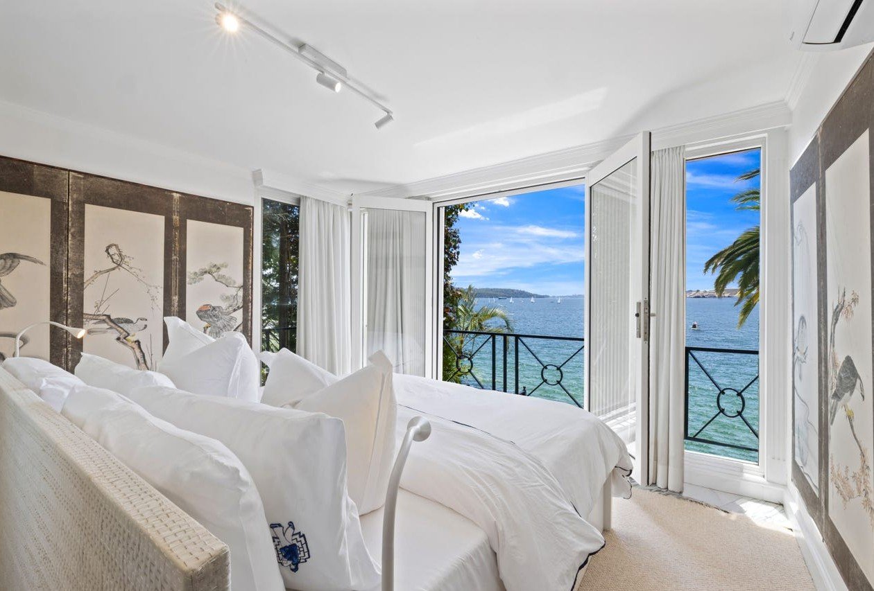 Luxury bedroom with harbour views and contemporary finishes