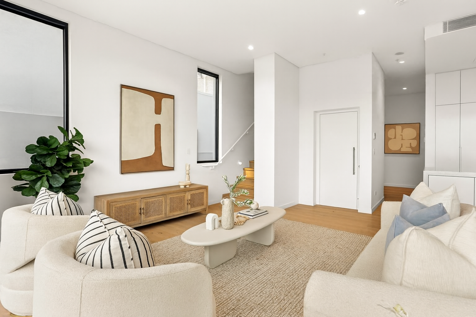 Discreet Lift Shop E Series lift blending into Rose Bay townhouse living room