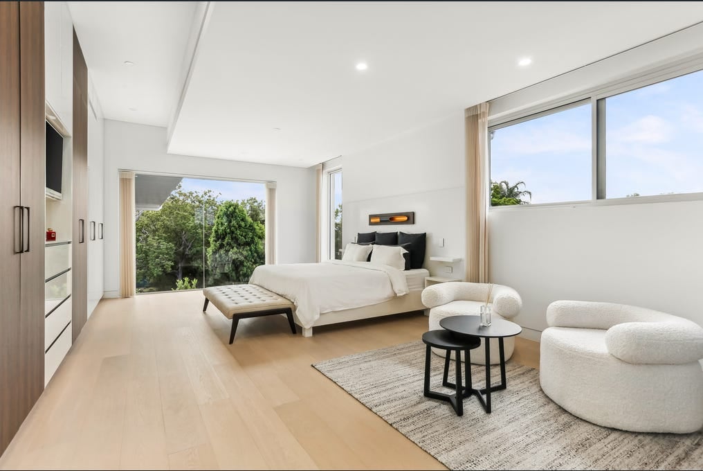 Frameless glass landing doors of a luxury home lift in Strathfield