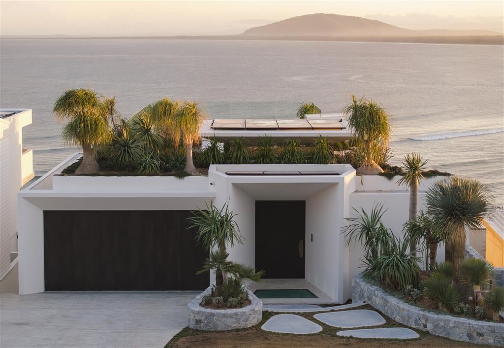 The Solstice exterior, HIA 2025 winner by Futureflip, above Seven Mile Beach with ocean views.
