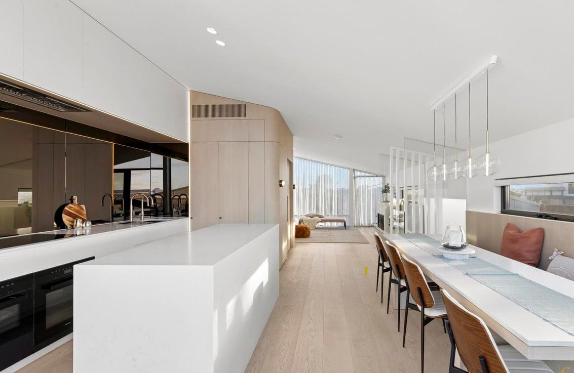 Open-plan living and dining area with integrated residential lift