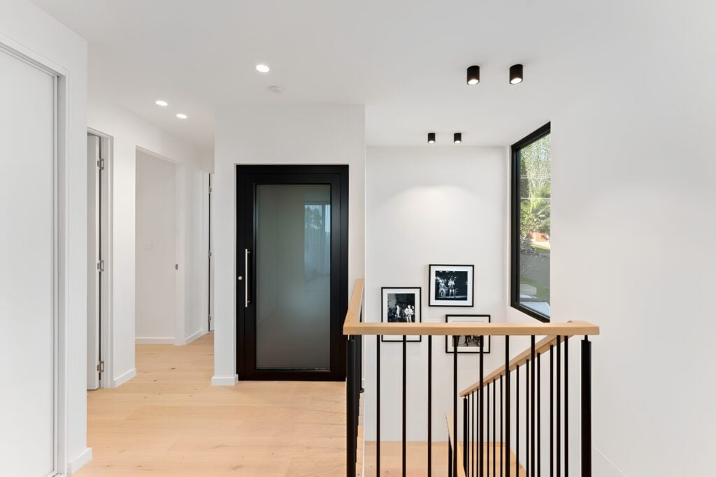 ift Shop A Series home elevator integrated into upper-level hallway of luxury Thirroul residence
