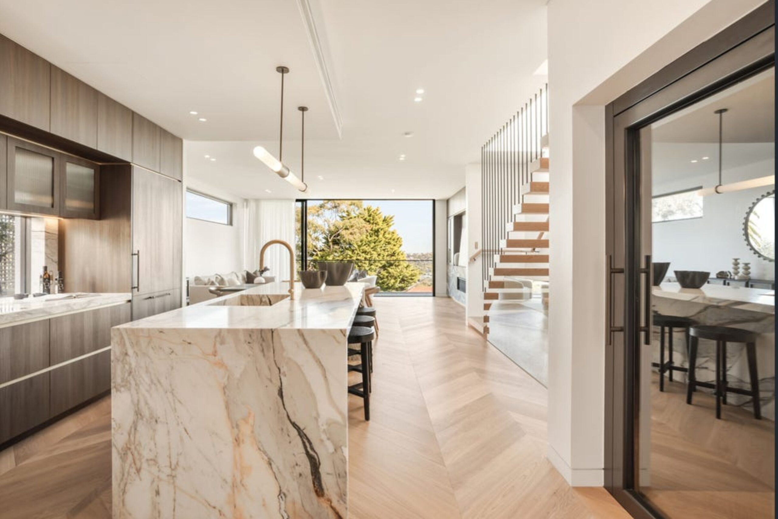 A Lift Shop swing door home lift with a mirrored landing door