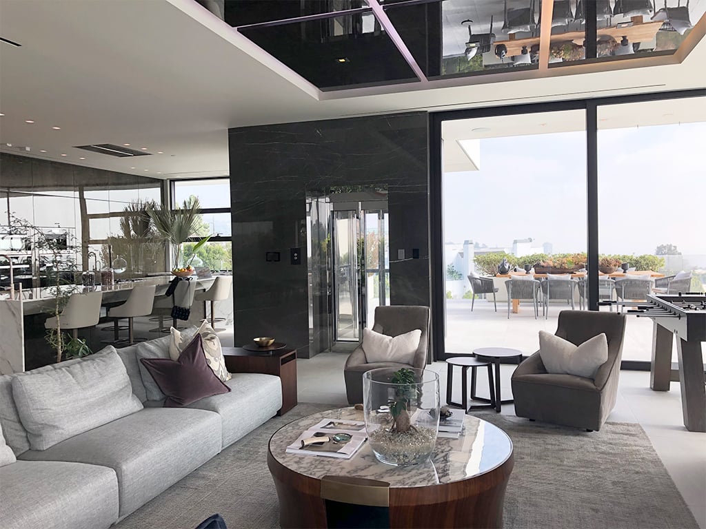 E Series framed glass sliding door lift
