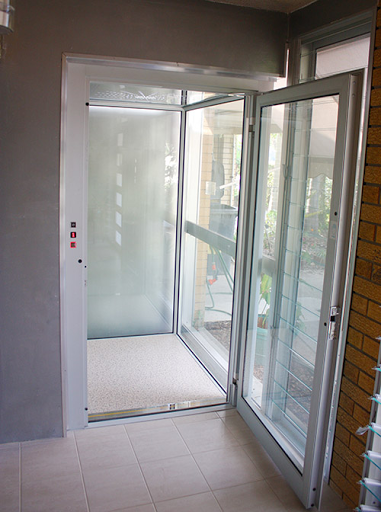 Black rubber trims holding wall panels in a standard home lift cabin