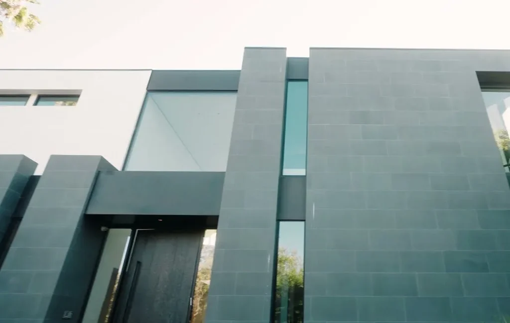 Dark stone facade of the modern home in the Beverly Hills flats