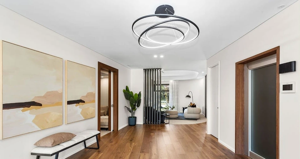 Entry hall with the A Series home lift landing door in a City Beach home, Perth