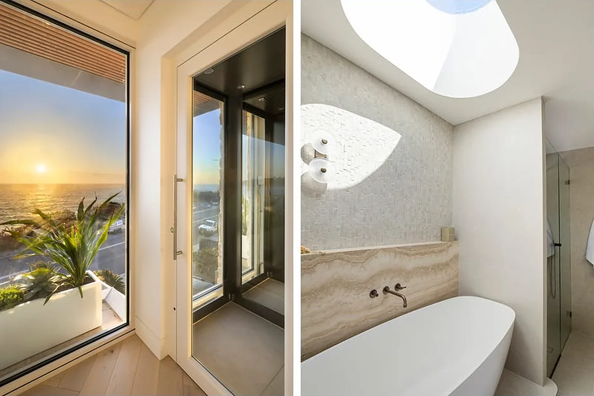 Glass-sided home lift beside a sunrise sea window in Freshwater Glass-sided home lift beside a sunrise sea window in Freshwater