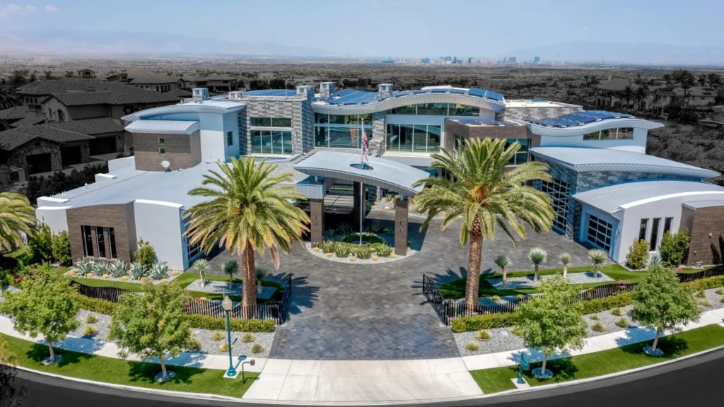 Aerial view of the modern Seven Hills estate in Henderson, with palm-lined motor court