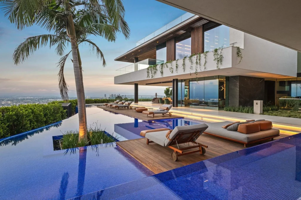 SAOTA-designed home in the Hollywood Hills with palm-lined infinity pool