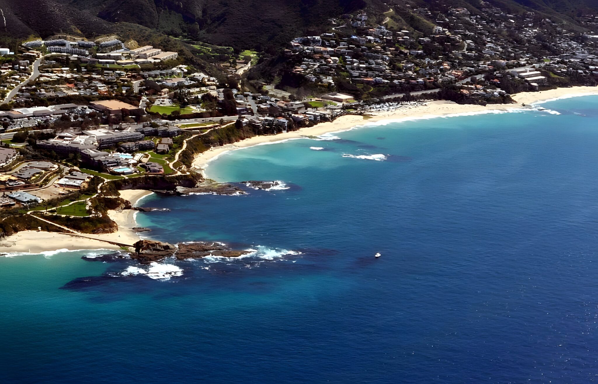 Aerial view of the rocky coastline, beaches and turquoise sea at Laguna Beach, California