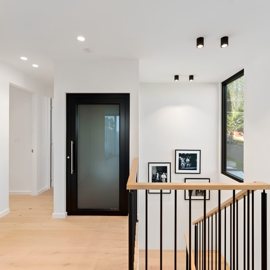ift Shop A Series home elevator integrated into upper-level hallway of luxury Thirroul residence