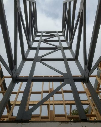 Home builder installing lift shaft during construction to future-proof for elevator installation