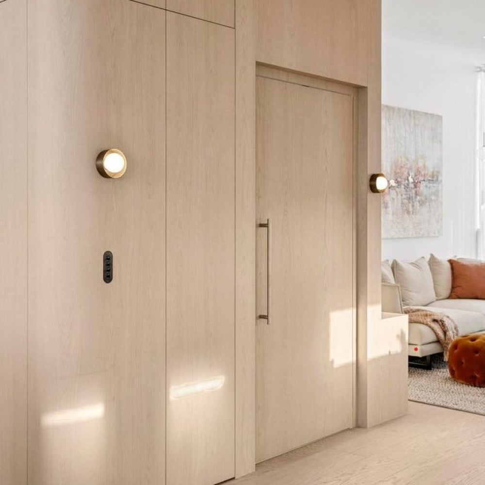 Custom timber-panelled residential lift integrated into luxury townhouse interior