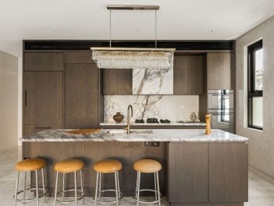 Luxury kitchen with marble island, custom joinery and premium appliances in Cremorne home